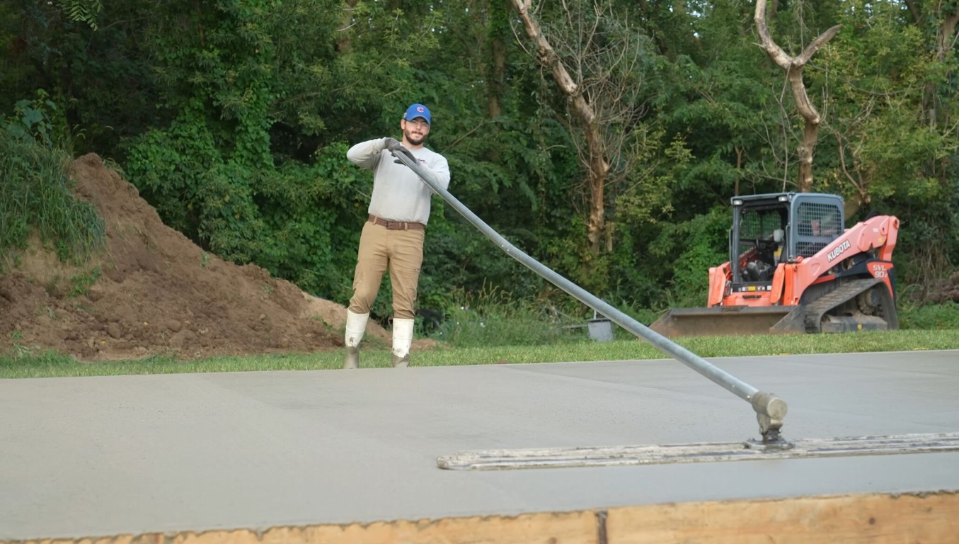 Professional concrete contractor finishing concrete surface in Rosemead, CA